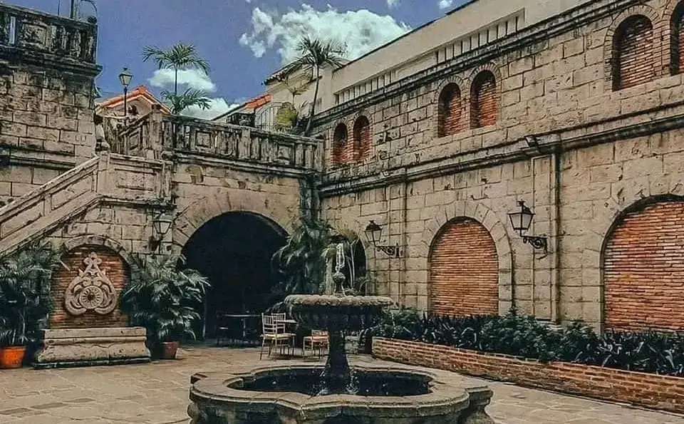Step back in time through colonial courtyards and vintage charm.