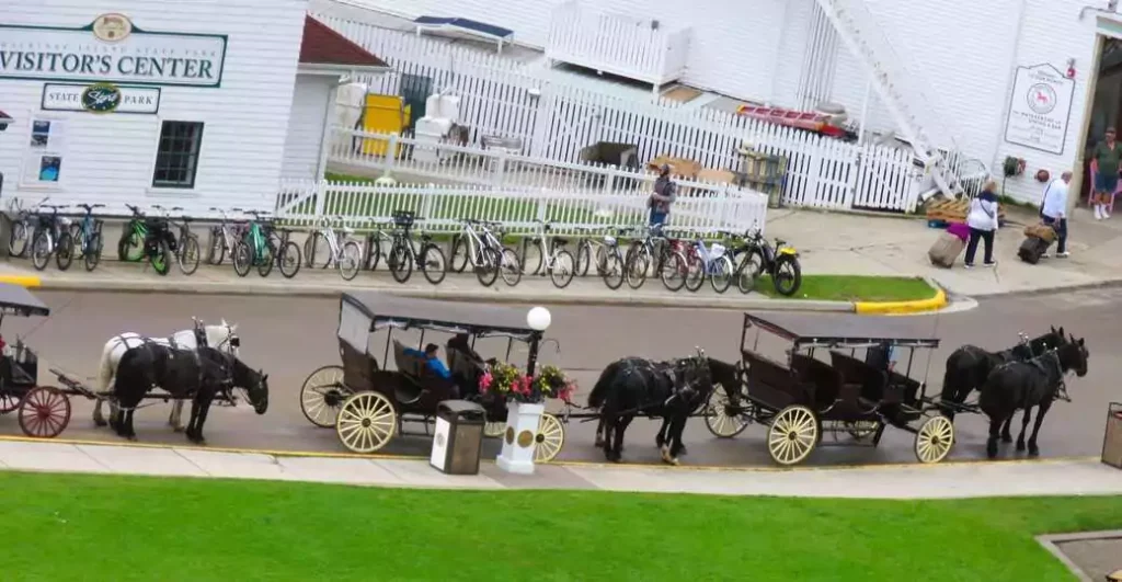 Stroll down Main Street, Mackinac Island—where time stands still and fudge is king.
